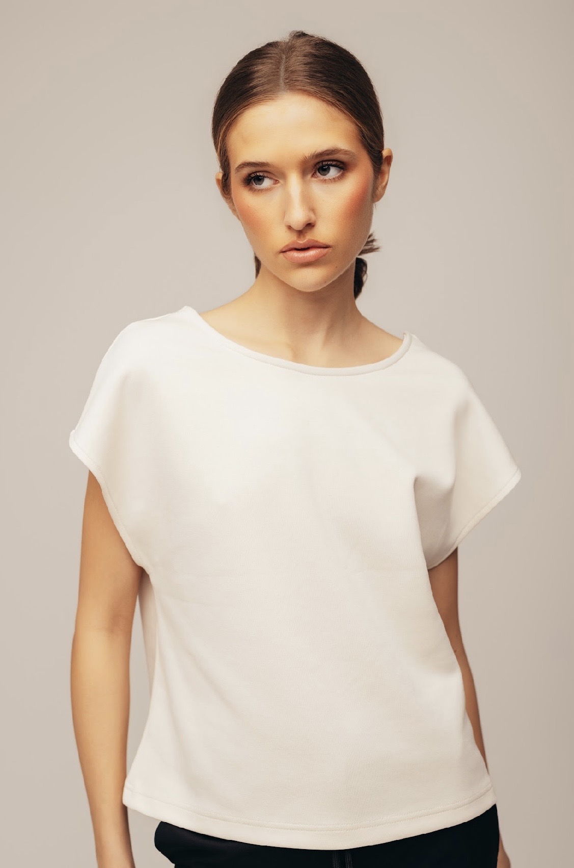 Loo T-shirt — white T-shirt with a printed back.